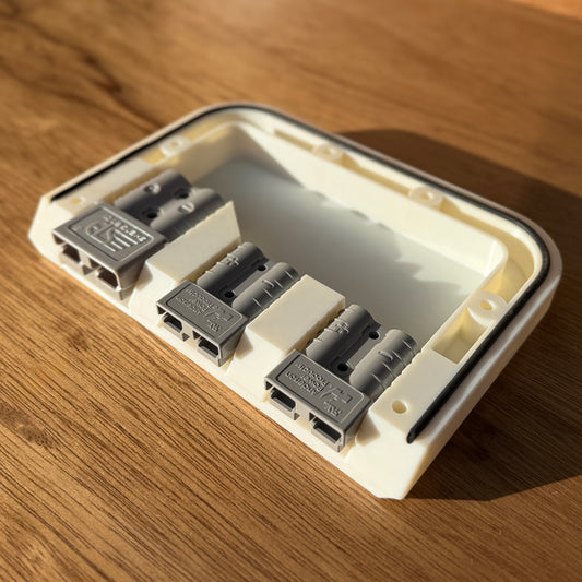 Rear view of triple Anderson plug surface mount showing three plug mounting areas